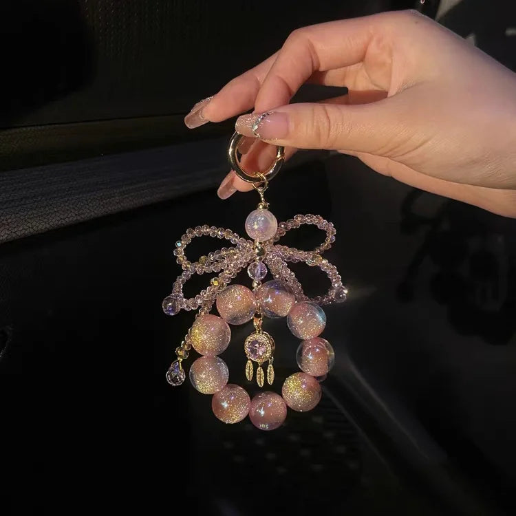 Stardust Peach Crystal Phone Charm – Iridescent Galaxy Dreamcatcher Pendant | Aurora-Inspired Bag Accessory | Elegant Pastel Charm for Women
