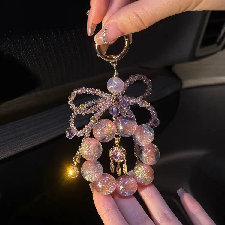 Stardust Peach Crystal Phone Charm – Iridescent Galaxy Dreamcatcher Pendant | Aurora-Inspired Bag Accessory | Elegant Pastel Charm for Women