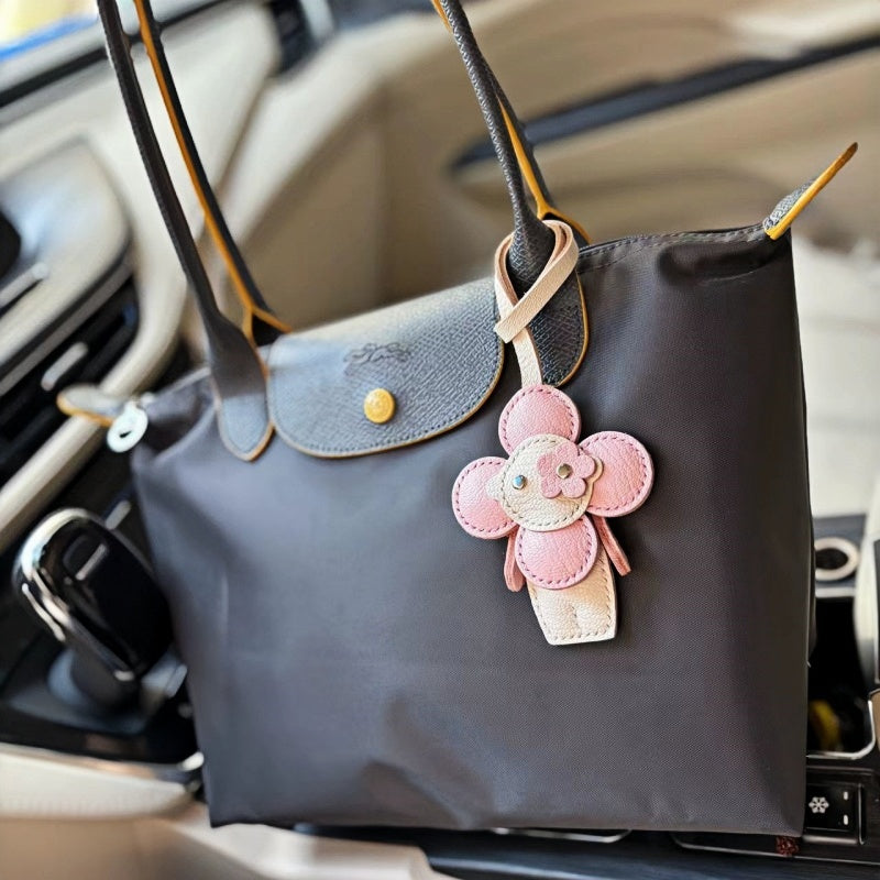 Handmade Sunflower Doll Leather Bag Charm – Full-Grain Leather Handbag Pendant & Keychain | Cute Floral Accessory for Women’s Tote, Purse & Keys | Artisan Crafted