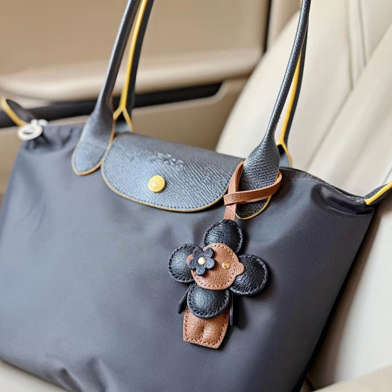 Handmade Sunflower Doll Leather Bag Charm – Full-Grain Leather Handbag Pendant & Keychain | Cute Floral Accessory for Women’s Tote, Purse & Keys | Artisan Crafted