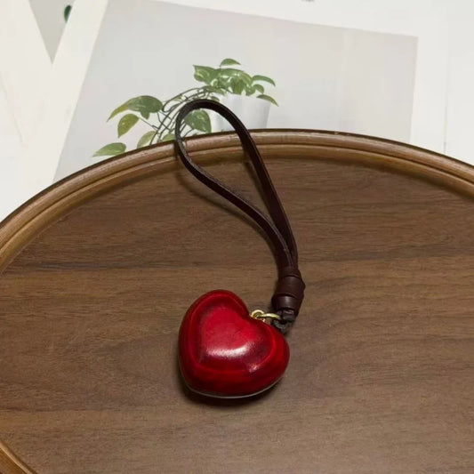 Hand-Polished Red Heart Leather Bag Charm – Sculpted Full-Grain Leather Pendant | Minimalist Luxury Handbag Accessory | Elegant Gift for Her