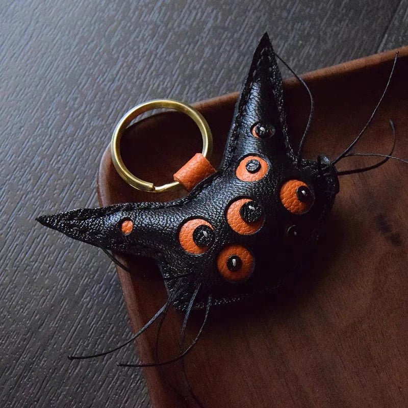 Designer Handcrafted Multi - Eyed Leather Cat Bag Charm | Unique Keychain for Bags & Cars | Personalized Gift for Cat Lovers - shewearing