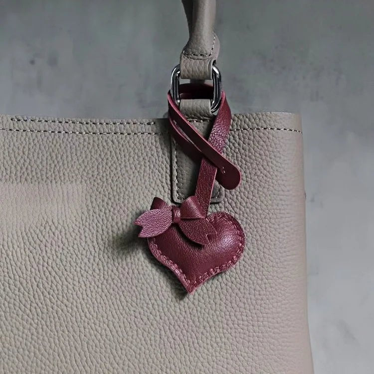 Heart - Shaped Bow Tie Leather Bag Charm | Minimalist Design | Handcrafted | Versatile and Elegant Gift - shewearing