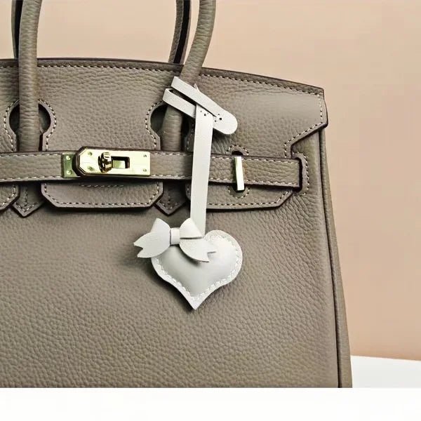 Heart - Shaped Bow Tie Leather Bag Charm | Minimalist Design | Handcrafted | Versatile and Elegant Gift - shewearing