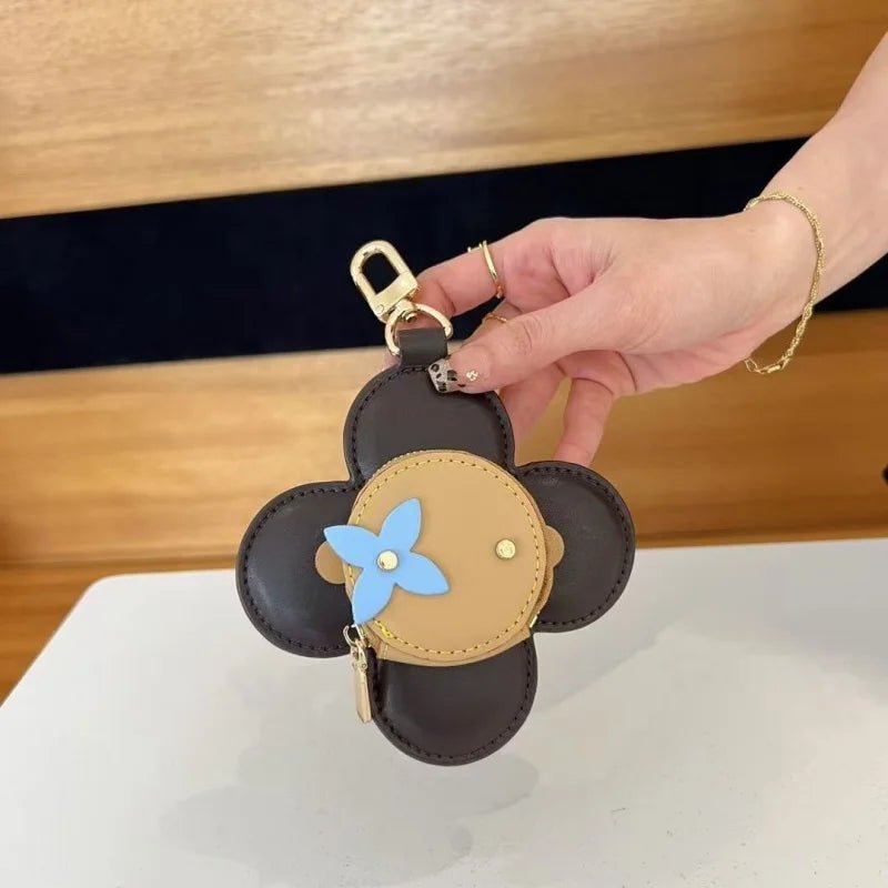 Sunflower Leather Coin & Earbud Case Charm – Designer Mini Flower Bag Pendant | Handmade Genuine Leather Keychain | Versatile Purse Accessory in Multiple Colors - shewearing