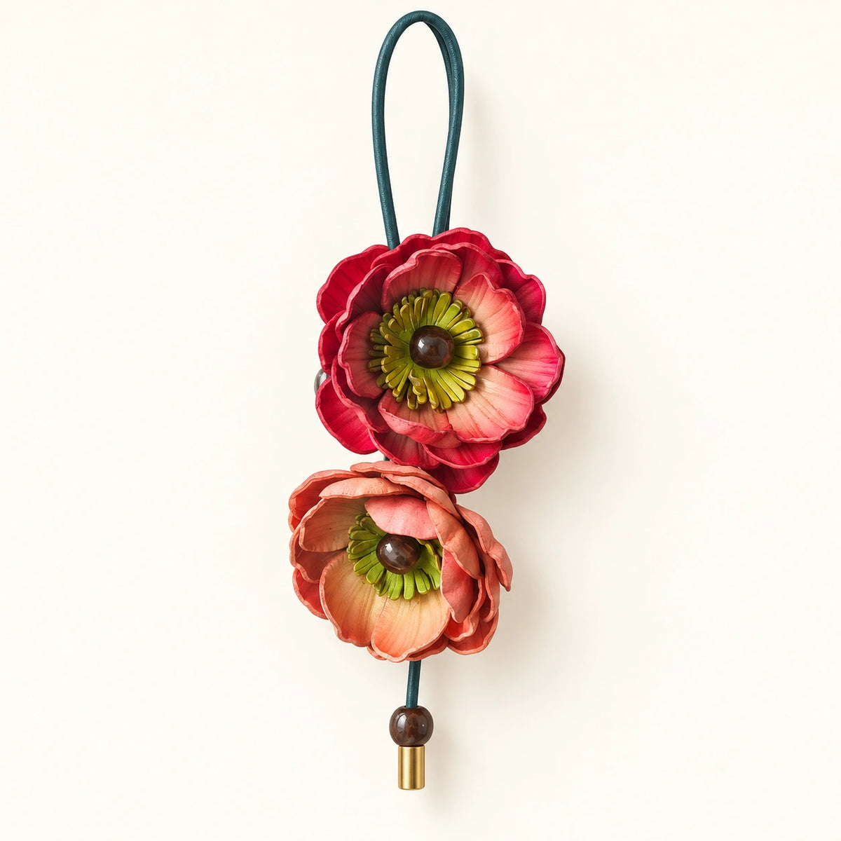 Crimson / Pink double bloom leather bag charm featuring fuchsia petals, yellow-green floral centers and turquoise decorative beads.