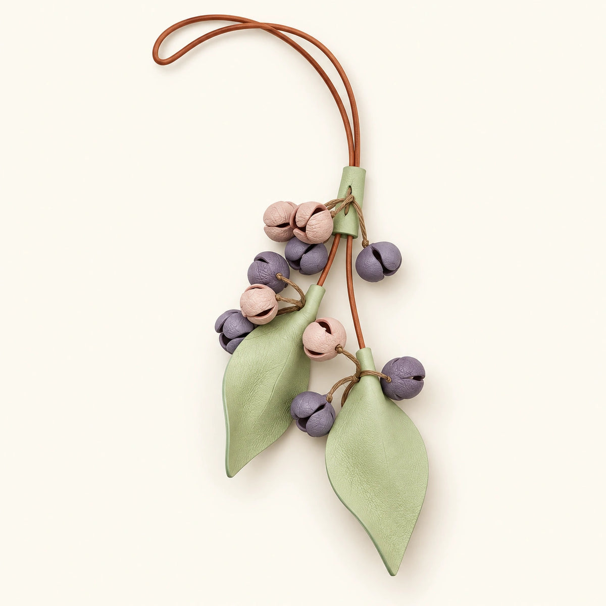 Morandi floral bud bag charm featuring dusty lavender and blush pink buds, two sage green leaves and a slender brown hanging loop on an ivory background.