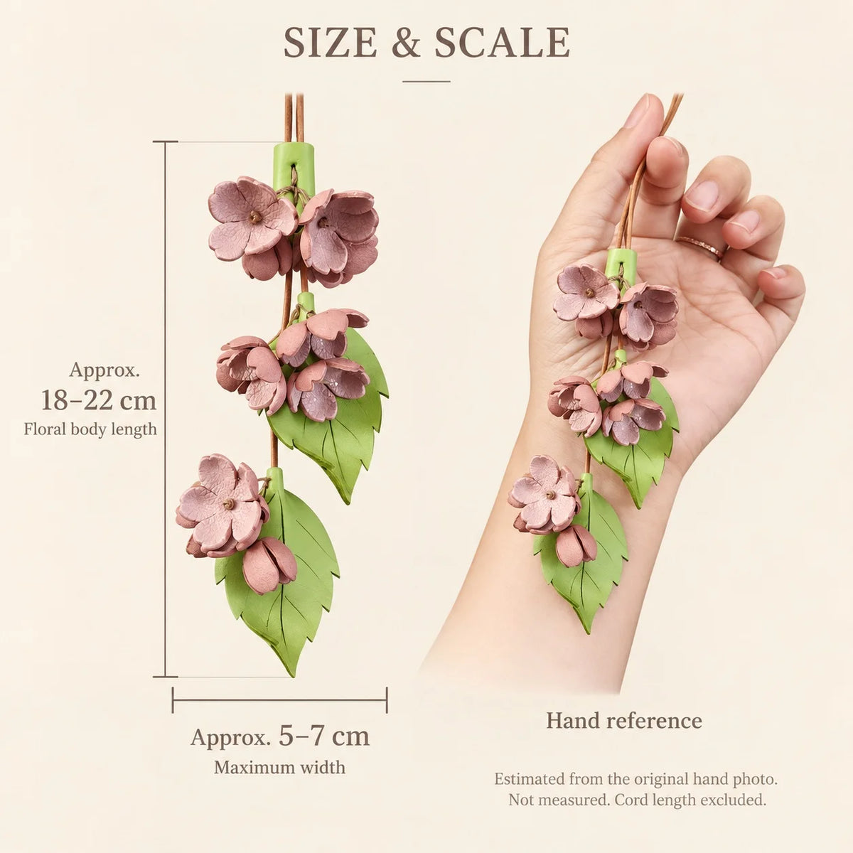Cherry Blossom Cascade size guide with hand reference: floral body approx. 18–22 cm long and 5–7 cm wide, estimated from a photo, not measured; cord excluded.