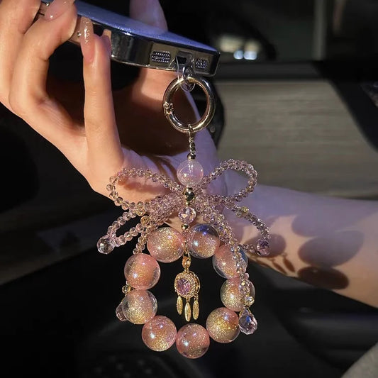 Stardust Peach Crystal Phone Charm – Iridescent Galaxy Dreamcatcher Pendant | Aurora-Inspired Bag Accessory | Elegant Pastel Charm for Women