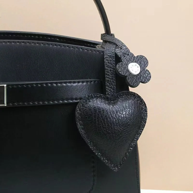 Handcrafted Leather Heart Bag Charm – Handmade Goatskin Heart Pendant with Floral Accent | Minimalist Romantic Bag Accessory | Timeless Gift for Her