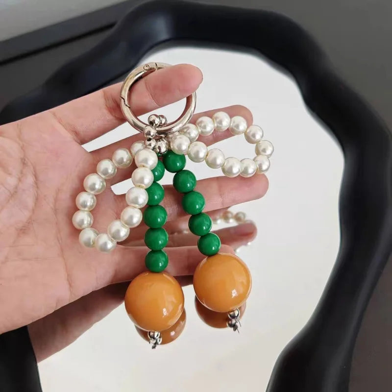 Big Cherry Beaded Bag Charm – Handmade Statement Fruit Keychain with Bowknot Design | Trendy Chunky Pendant for Totes, Backpacks & Gifts