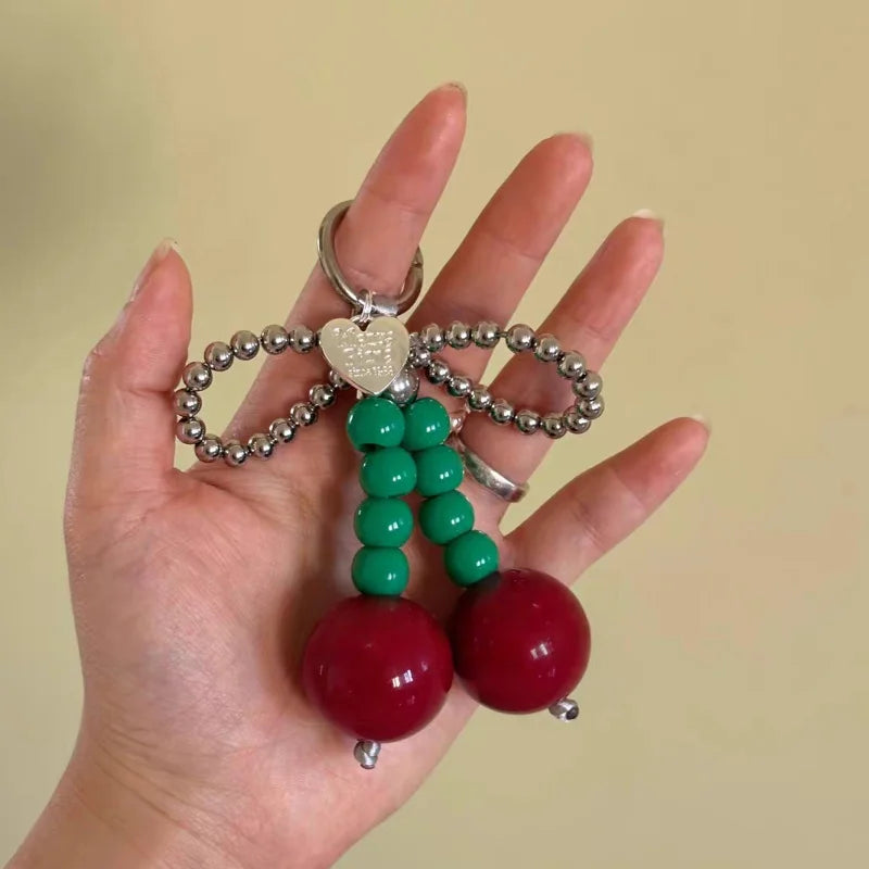 Big Cherry Beaded Bag Charm – Handmade Statement Fruit Keychain with Bowknot Design | Trendy Chunky Pendant for Totes, Backpacks & Gifts