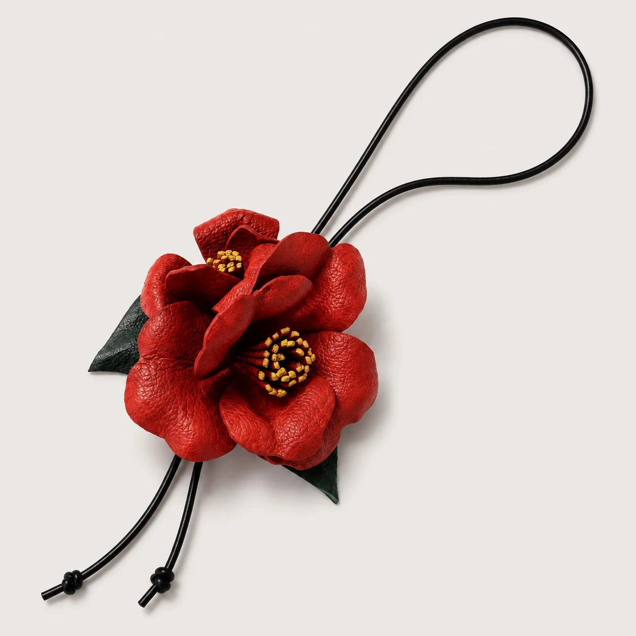 Handcrafted Leather Camellia Floral Bag Charm with Sculpted Double Blooms and Botanical Leaf Details for Handbags