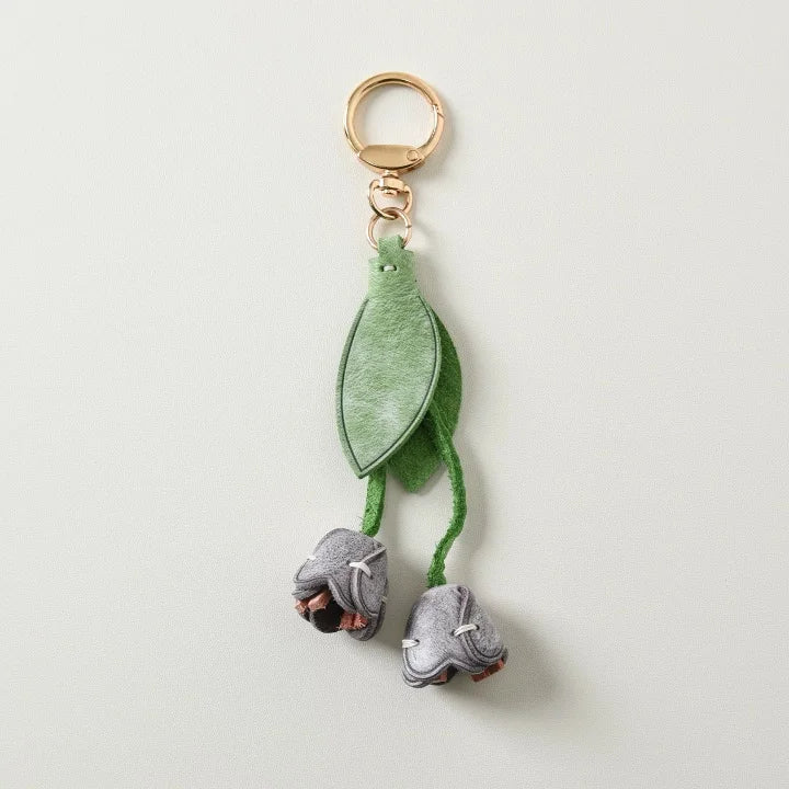 Dije de tulipán para bolso de cuero artesanal – Llavero con colgante floral de piel de vaca encerada | Accesorio floral cosido a mano para bolsos | Elegante regalo botánico para ella