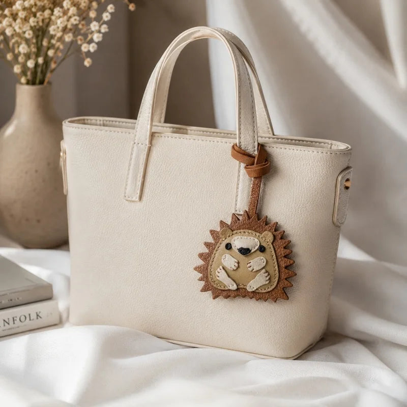 Curled-up Hedgehog Leather Bag Charm – Handcrafted Full-Grain Goatskin Keychain, Unique Gift for Women