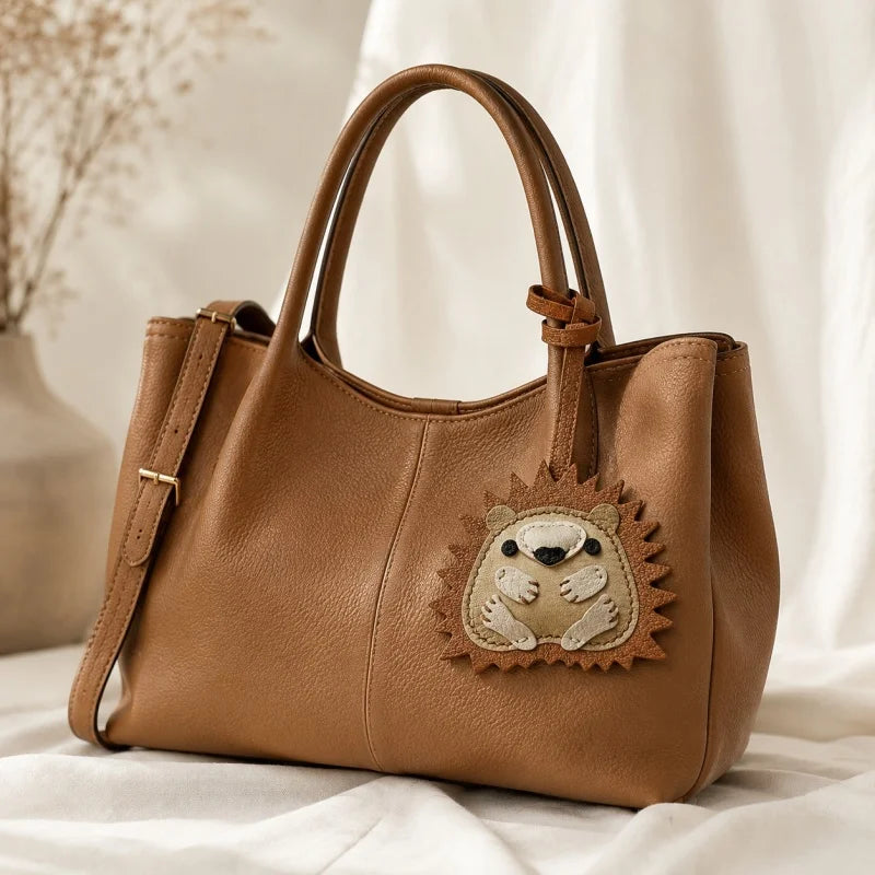 Curled-up Hedgehog Leather Bag Charm – Handcrafted Full-Grain Goatskin Keychain, Unique Gift for Women