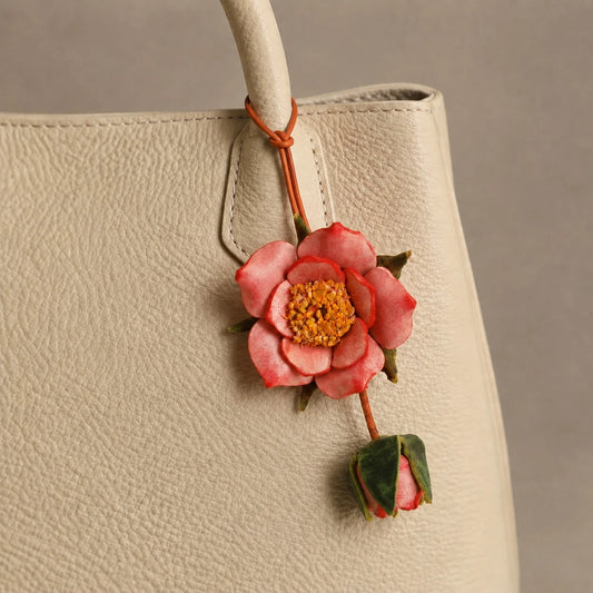 Handcrafted Vegetable-Tanned Leather Rose and Bud Bag Charm with Hand-Dyed Petals, Textured Floral Center, and Slender Loop for Everyday Handbags