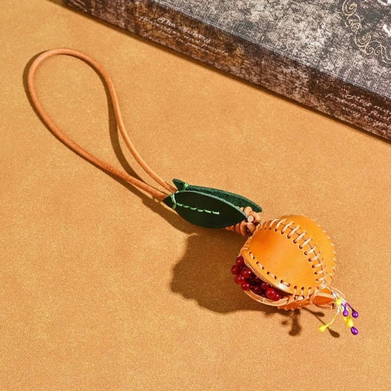 Hand-stitched Leather Pomegranate Charm – Premium Vegetable-tanned Leather Bag Pendant | Creative Accessory for Bags & Keychains
