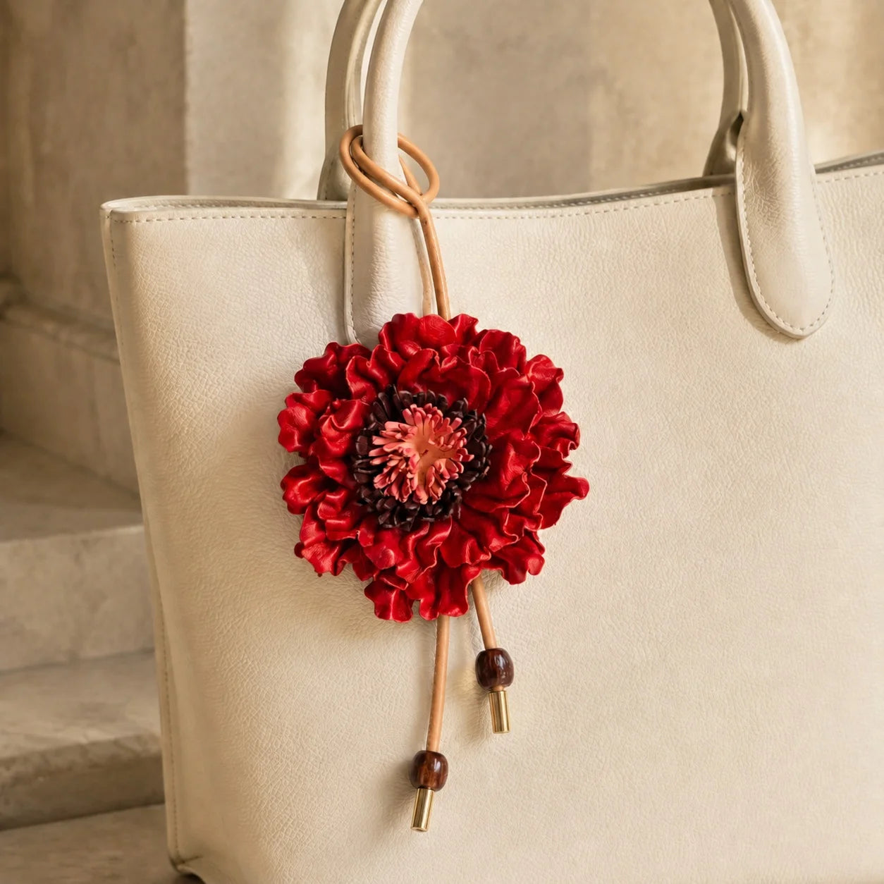 Handcrafted Sculptural Genuine Leather Floral Bag Charm with Layered Petals, Loop Strap, Beaded Cord Drops and Gold-Tone Tips for Totes and Handbags