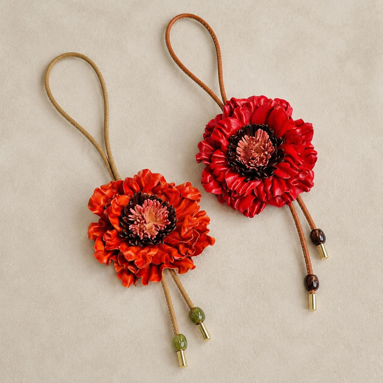 Handcrafted Sculptural Genuine Leather Floral Bag Charm with Layered Petals, Loop Strap, Beaded Cord Drops and Gold-Tone Tips for Totes and Handbags