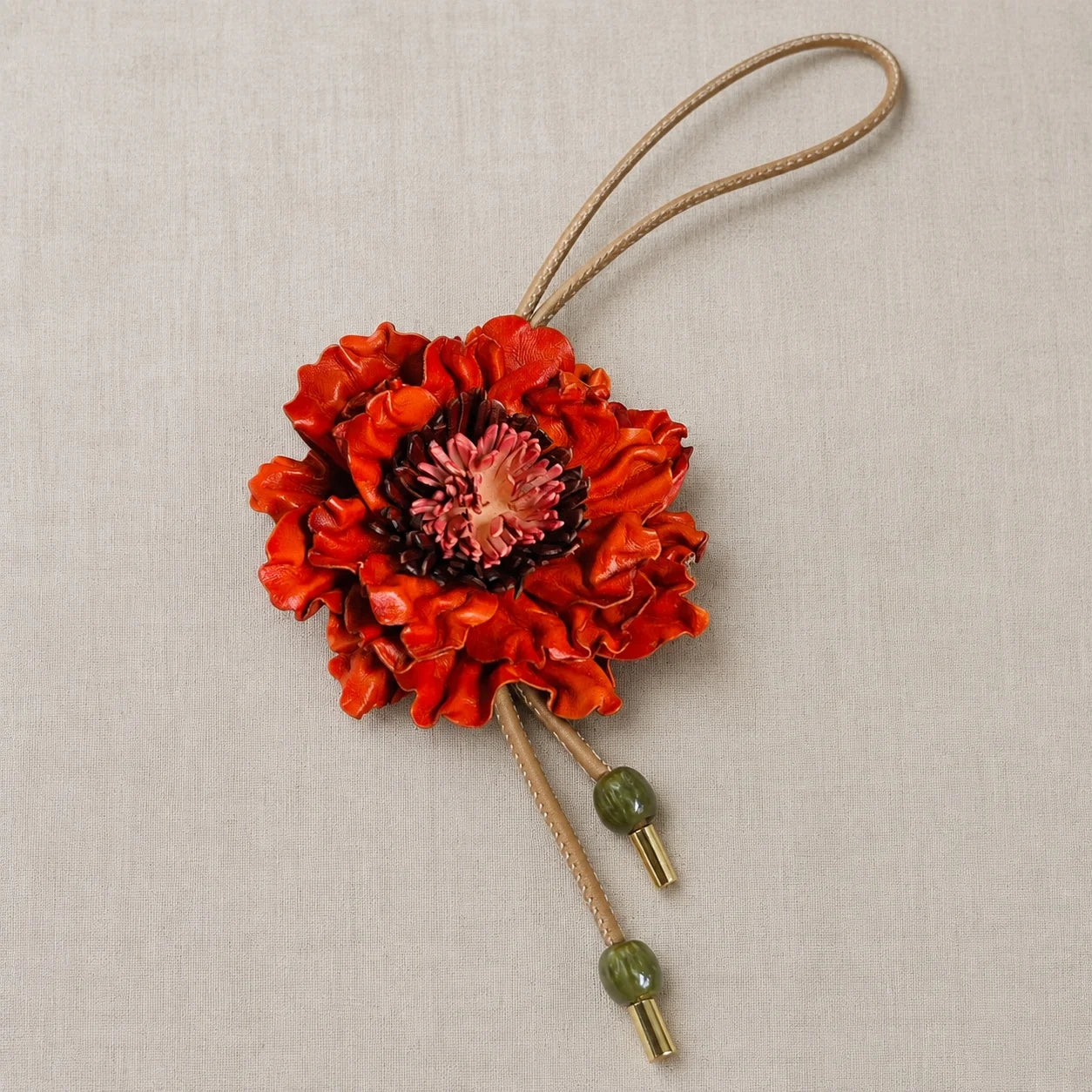 Handcrafted Sculptural Genuine Leather Floral Bag Charm with Layered Petals, Loop Strap, Beaded Cord Drops and Gold-Tone Tips for Totes and Handbags