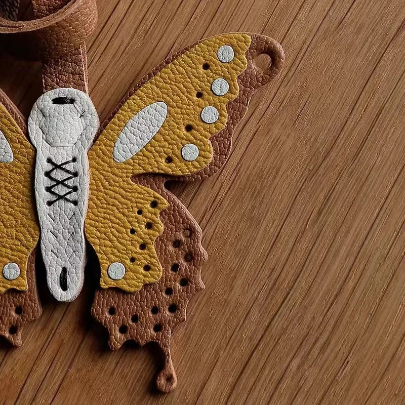 Handmade Leather Butterfly Bag Charm – Artisan Sheepskin Pendant & Keychain | Intricate Cutout Design | Luxury Handbag Accessory & Couple Gift