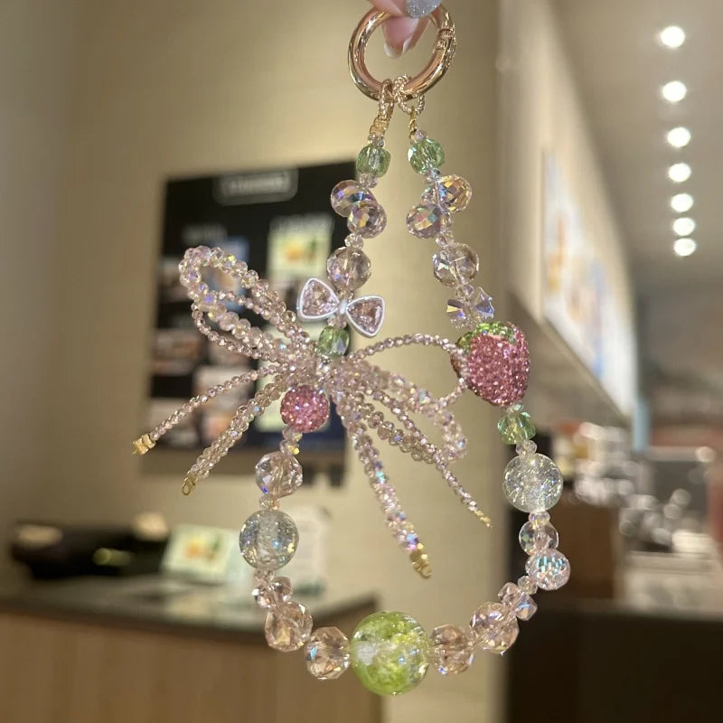 Strawberry Crystal Bow Phone Charm – Sweet Style Full Rhinestone Wrist Strap for Phones & Bags | Glittery Bag Pendant | Shiny Gift for Her