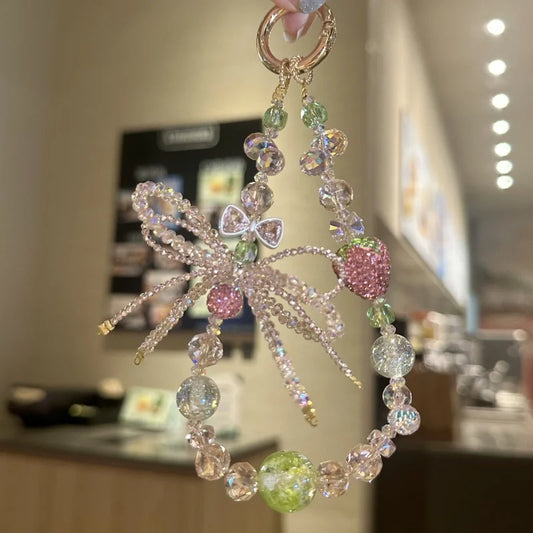 Strawberry Crystal Bow Phone Charm – Sweet Style Full Rhinestone Wrist Strap for Phones & Bags | Glittery Bag Pendant | Shiny Gift for Her
