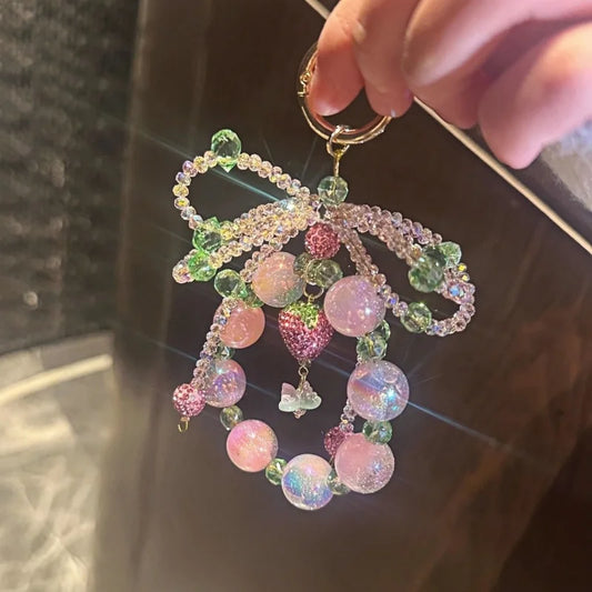 Strawberry Crystal Bow Phone Charm – Sweet Style Full Rhinestone Wrist Strap for Phones & Bags | Glittery Bag Pendant | Shiny Gift for Her