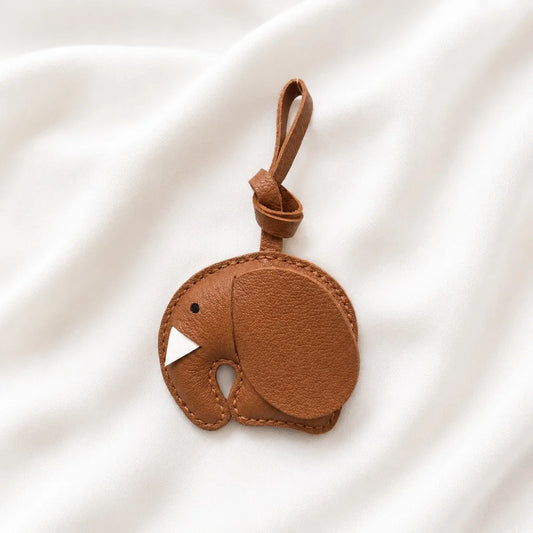 Dije minimalista de elefante para bolso, hecho a mano | Accesorio para bolso de piel flor de doble cara | Llavero con símbolo de suerte y sabiduría