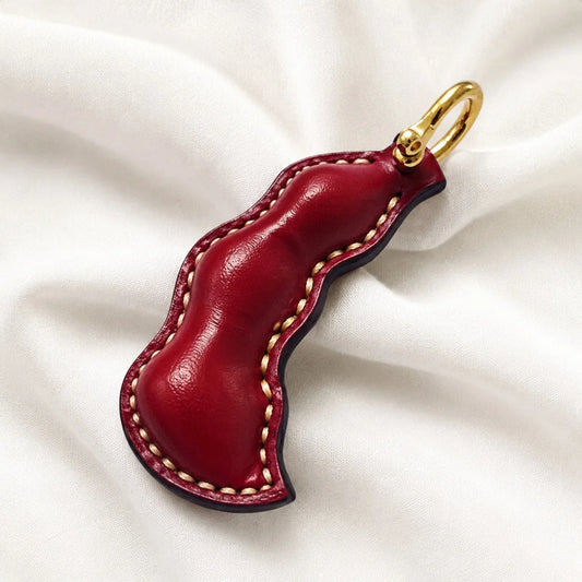 Dije de guisante de cuero con paz: adorno artesanal para bolso de piel de vacuno plena flor, llavero de doble cara, accesorio para coche, regalo único para cualquier ocasión.