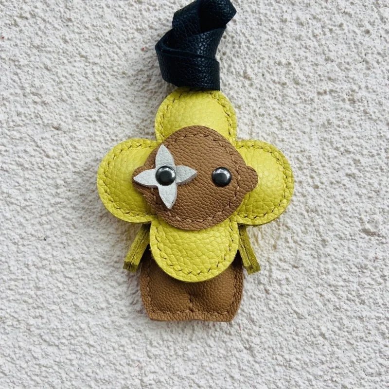 Clover Doll Sunflower Leather Bag Charm – Handmade French Lambskin Pendant | Whimsical Cartoon Keychain | Unique Luxury Accessory & Cute Gift for Women - shewearing