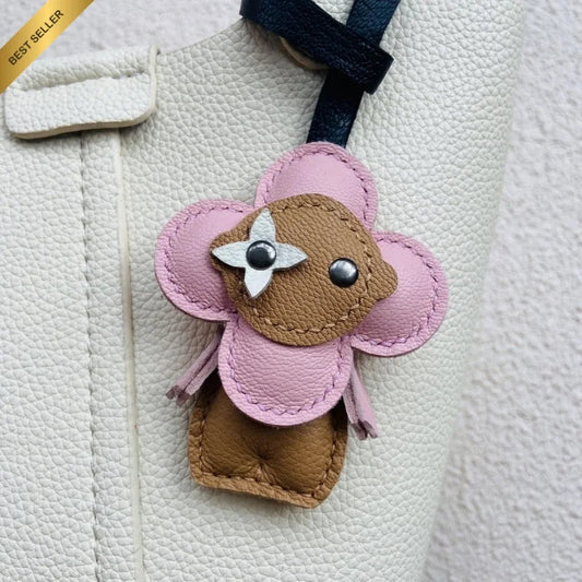 Clover Doll Sunflower Leather Bag Charm – Handmade French Lambskin Pendant | Whimsical Cartoon Keychain | Unique Luxury Accessory & Cute Gift for Women - shewearing