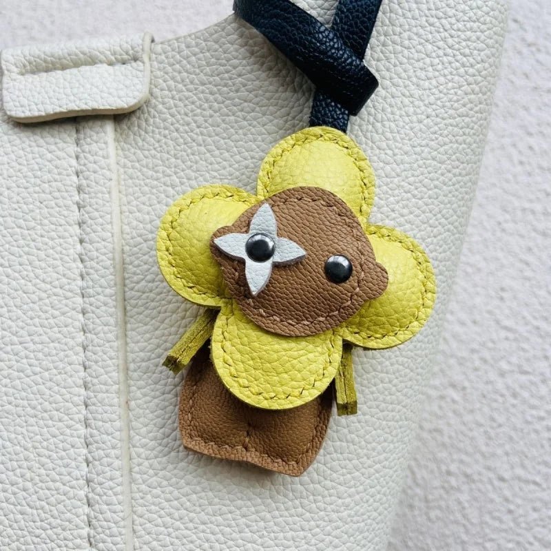 Clover Doll Sunflower Leather Bag Charm – Handmade French Lambskin Pendant | Whimsical Cartoon Keychain | Unique Luxury Accessory & Cute Gift for Women - shewearing