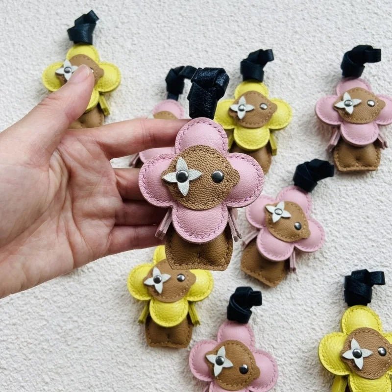 Clover Doll Sunflower Leather Bag Charm – Handmade French Lambskin Pendant | Whimsical Cartoon Keychain | Unique Luxury Accessory & Cute Gift for Women - shewearing