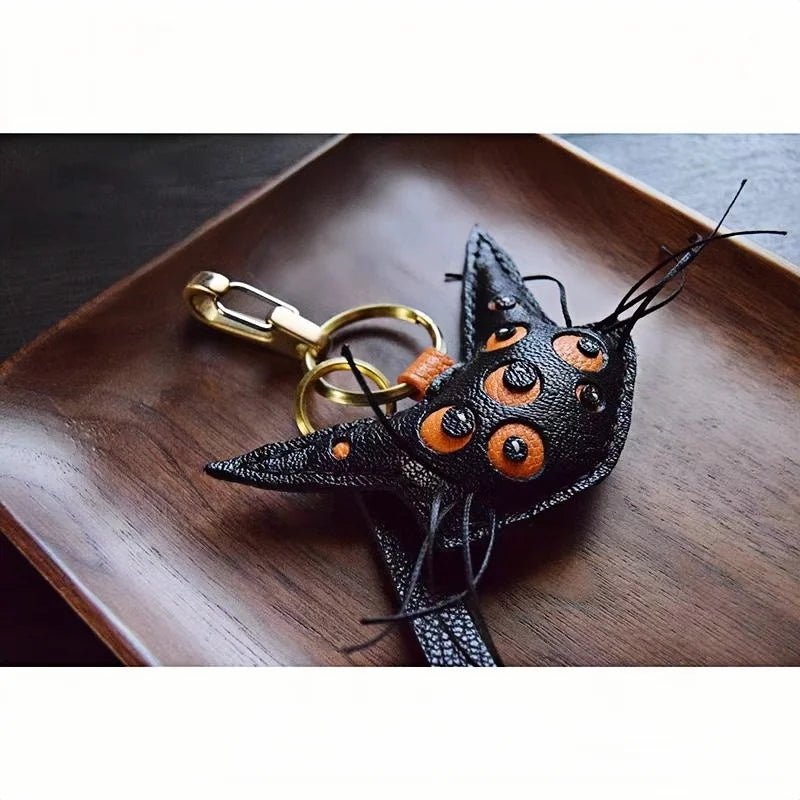 Designer Handcrafted Multi - Eyed Leather Cat Bag Charm | Unique Keychain for Bags & Cars | Personalized Gift for Cat Lovers - shewearing