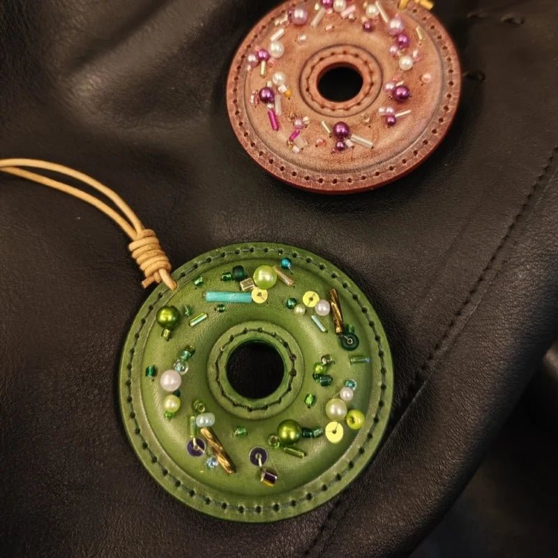Handcrafted Leather Donut Bag Charm – Premium Full - Grain Leather Pendant with Beaded Sprinkles | Cute Donut Keychain | Whimsical Gift for Bags & Cars - shewearing