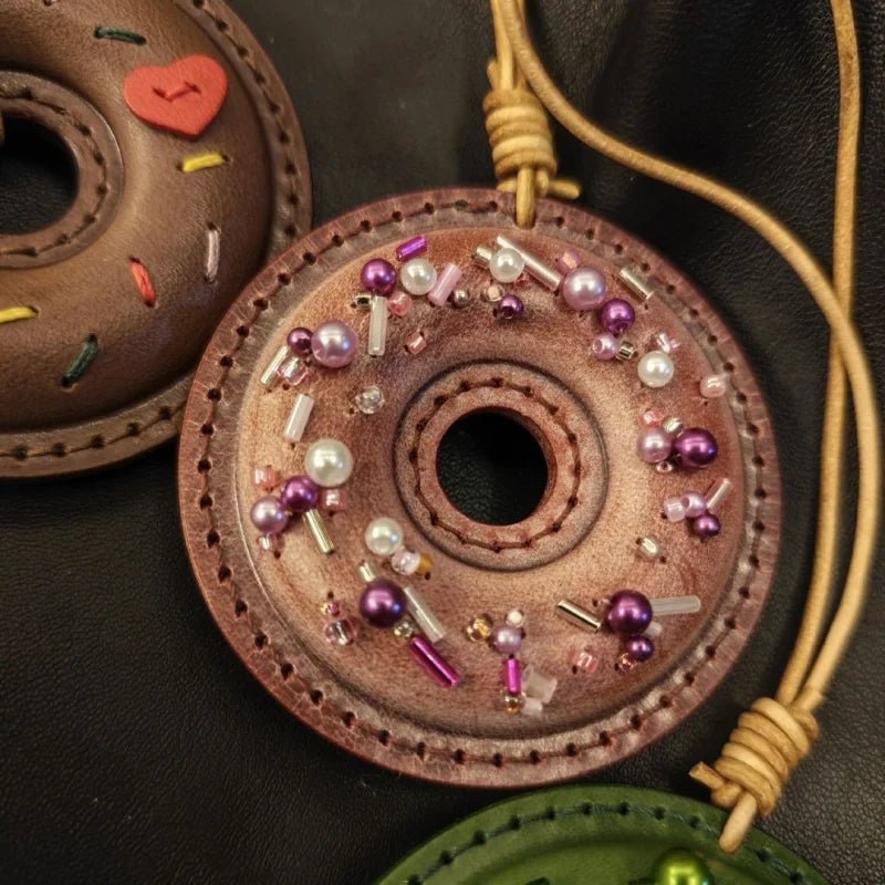 Handcrafted Leather Donut Bag Charm – Premium Full - Grain Leather Pendant with Beaded Sprinkles | Cute Donut Keychain | Whimsical Gift for Bags & Cars - shewearing