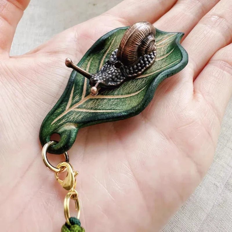 Handcrafted Leather Leaf & Bronze Snail Bag Charm – Unique Nature - Inspired Pendant | Artistic Handmade Accessory for Bags, Keys & Gifts - shewearing