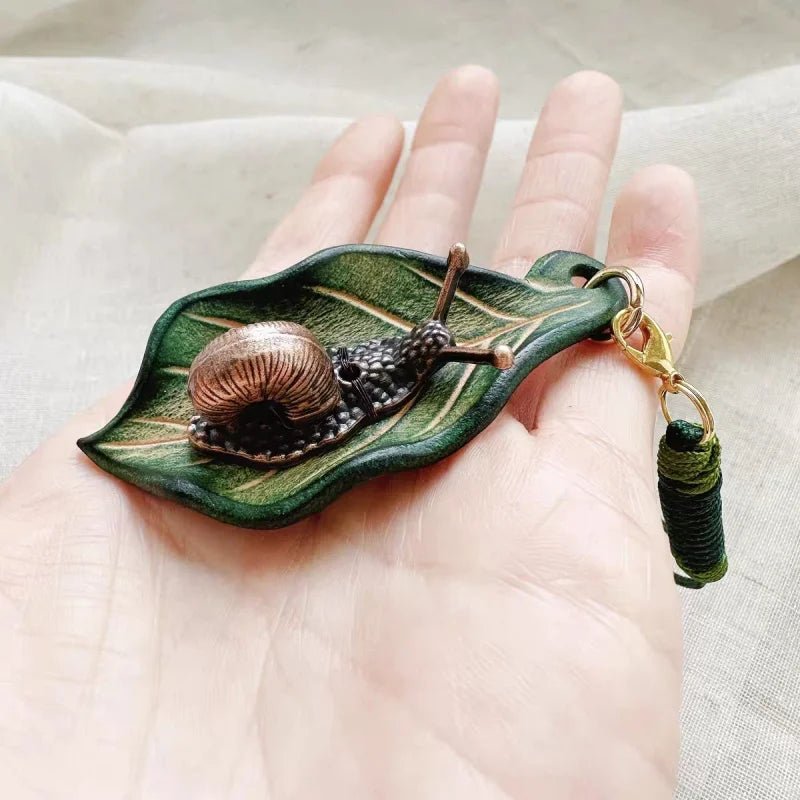 Handcrafted Leather Leaf & Bronze Snail Bag Charm – Unique Nature - Inspired Pendant | Artistic Handmade Accessory for Bags, Keys & Gifts - shewearing
