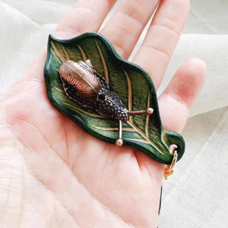 Handcrafted Leather Leaf & Bronze Snail Bag Charm – Unique Nature - Inspired Pendant | Artistic Handmade Accessory for Bags, Keys & Gifts - shewearing