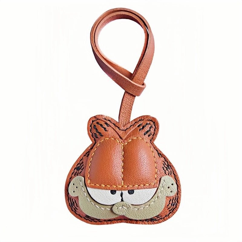 Handcrafted Leather Orange Cat Bag Charm – Cartoon Cat Design, Full - Grain Lambskin, Playful Accessory for Keys or Bags, Thoughtful Gift for Women - shewearing