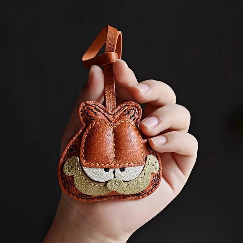 Handcrafted Leather Orange Cat Bag Charm – Cartoon Cat Design, Full - Grain Lambskin, Playful Accessory for Keys or Bags, Thoughtful Gift for Women - shewearing
