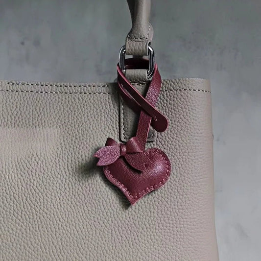 Heart - Shaped Bow Tie Leather Bag Charm | Minimalist Design | Handcrafted | Versatile and Elegant Gift - shewearing