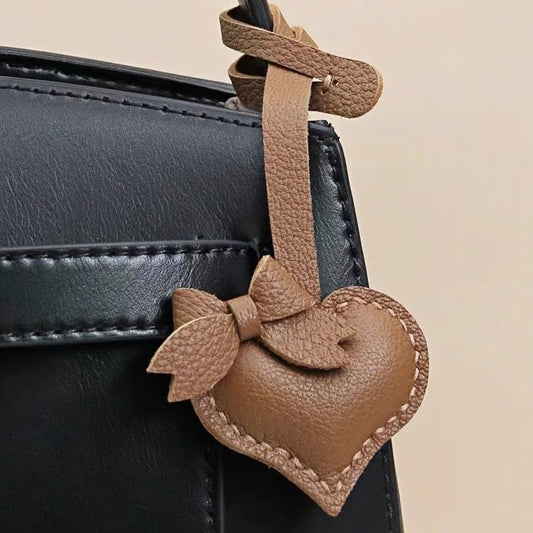 Heart - Shaped Bow Tie Leather Bag Charm | Minimalist Design | Handcrafted | Versatile and Elegant Gift - shewearing
