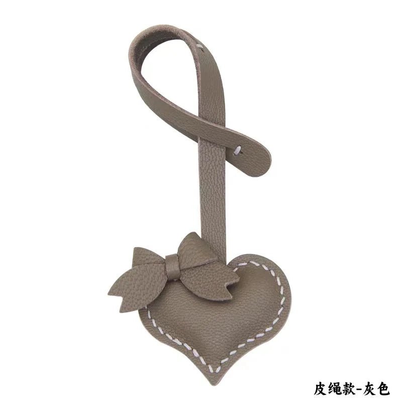 Heart - Shaped Bow Tie Leather Bag Charm | Minimalist Design | Handcrafted | Versatile and Elegant Gift - shewearing