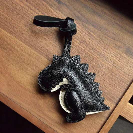 Midnight Dino Leather Bag Charm – Handcrafted Full - Grain Lambskin Keychain | Cute Dinosaur Ornament | Whimsical Gift for Adults & Kids - shewearing
