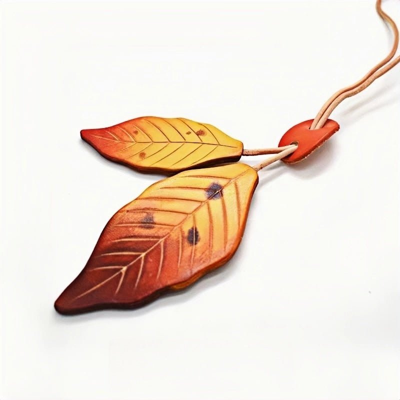 Nordic Lucky Leaves Leather Charm – Handcrafted Genuine Cowhide Leaf Bag Charm, Car Ornament, and Bookmark Accessory - shewearing