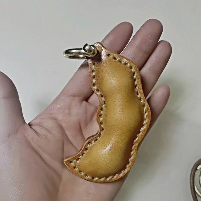 Peaceful Leather Pea Charm – Handcrafted Full - Grain Cowhide Bag Ornament, Dual - Sided Keychain, Car Accessory, Unique Gift for Any Occasion - shewearing