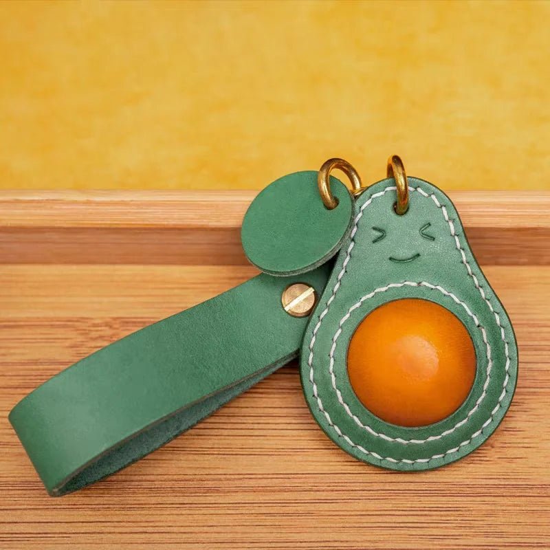 Smiling Avocado Leather Bag Charm – Handmade Italian Vegetable - Tanned Keychain | Whimsical Green Fruit Pendant | Cute Handbag Accessory for Women - shewearing